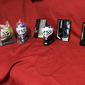 NHL GOALIES masks and sticks